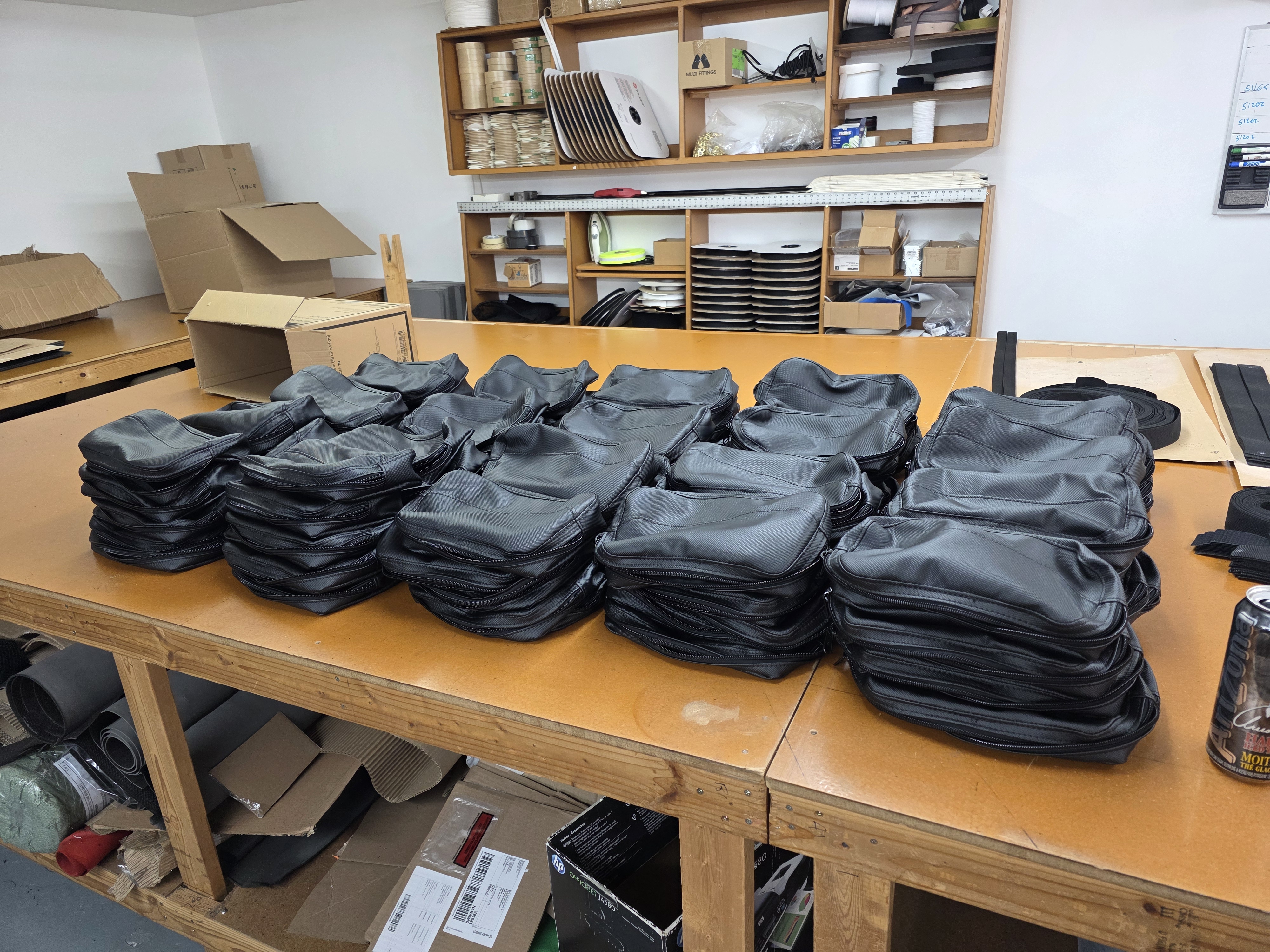 Batch of finished zippered textile products
